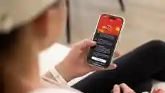 Lauren Parker looks at her screen and sees the Red Energy mobile app
