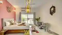 Modern bedroom with an air conditioner unit mounted on the wall.