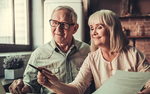 Couple studying documents
